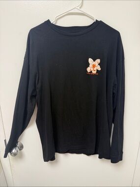 Lira MFG Co. Black Long-Sleeve Tee with Orange Lilly Emblem